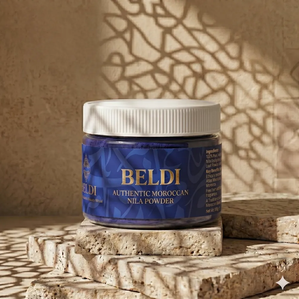 Beldi Authentic Moroccan Nila Powder in a cobalt-blue jar on travertine.